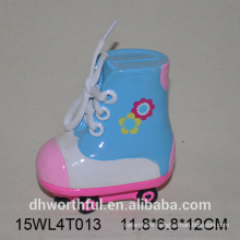 Creative ceramic piggy bank with boots design